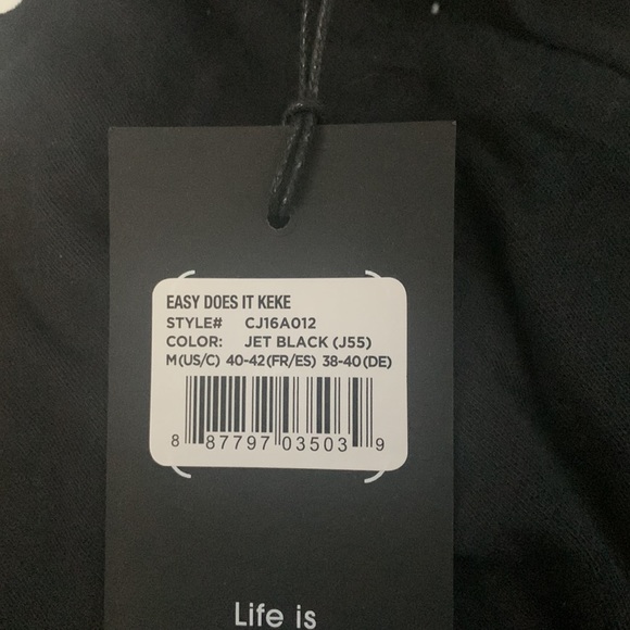 A black t-shirt with a heart on the middle - Picture 2 of 2